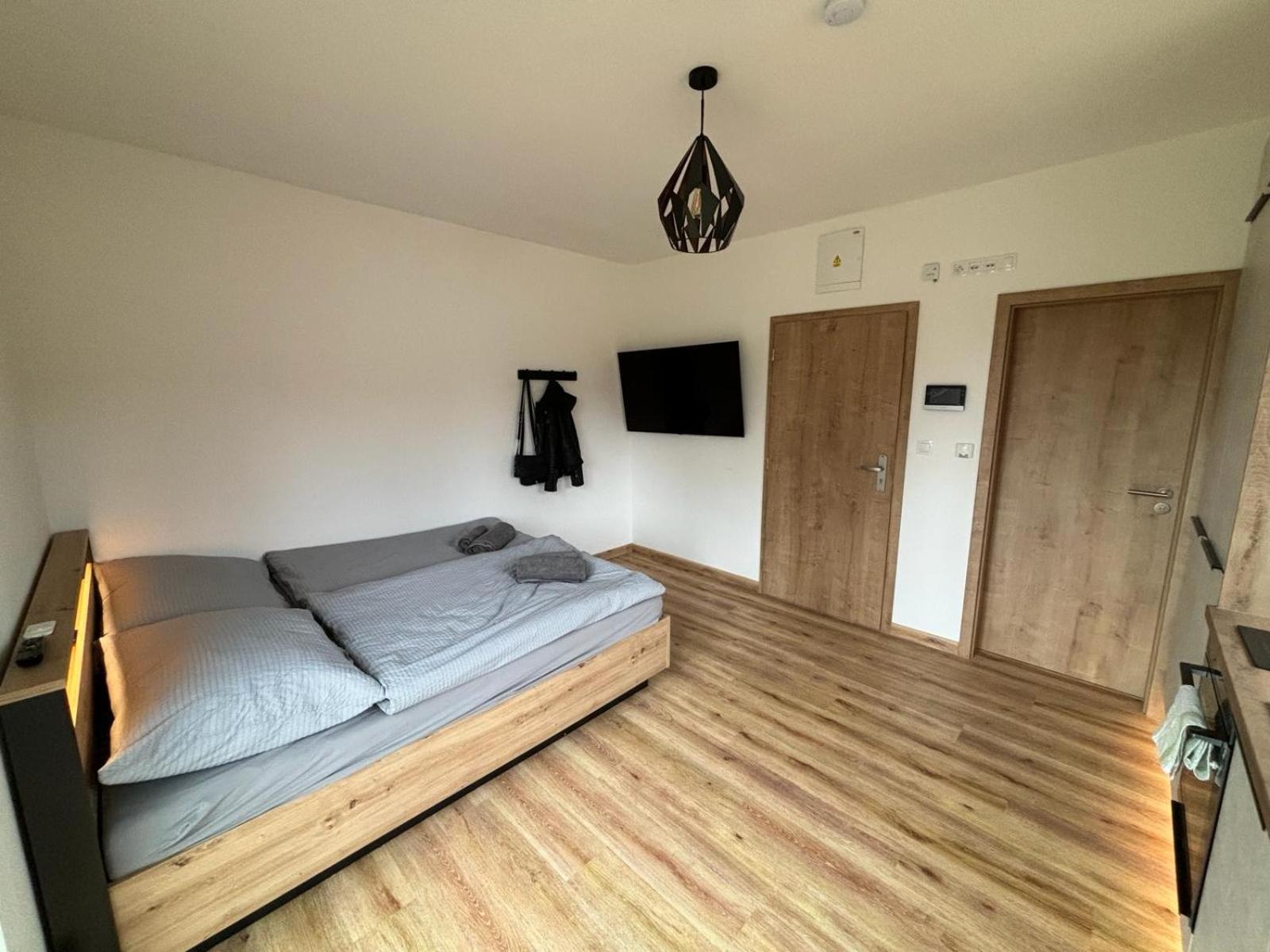 Apartmany U Plaze Lipna - Male Lipno แชร์นาฟ โปชูมาวี ภายนอก รูปภาพ